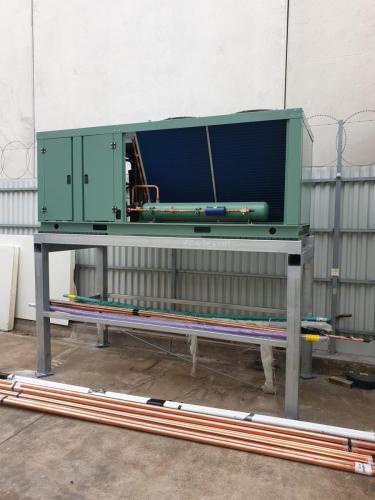 Outdoor_unit_mounted_on_frame_work_1